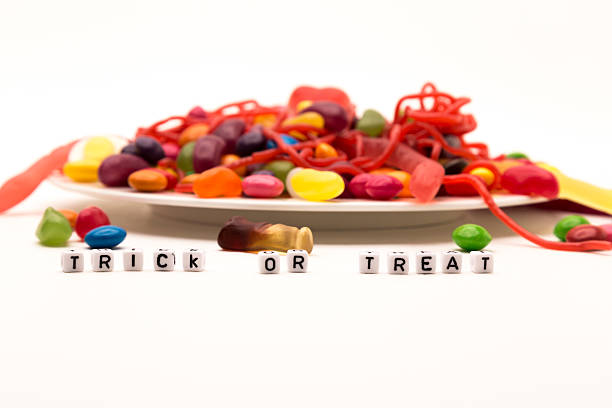 istock Halloween Trick or Treat with a dish of candy 512940091