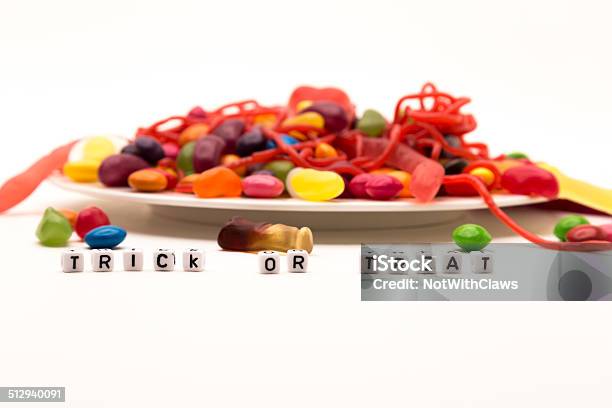 Halloween Trick Or Treat With A Dish Of Candy Stock Photo - Download Image Now - Insect, Jellybean, American Culture