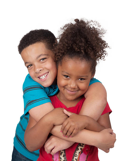 istock African-Canadian Siblings Hugging 512940611
