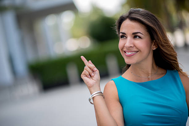 istock Business woman pointing something 512941353