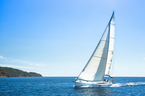 Sailing, racing yachts on the high seas. Luxury yachts.