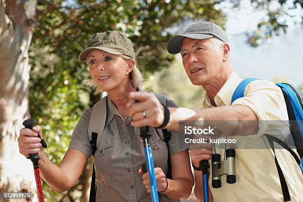 I Think We Should Go That Way Stock Photo - Download Image Now - 60-69 Years, Active Lifestyle, Active Seniors