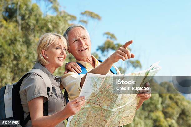 I Dont See That On The Map Stock Photo - Download Image Now - 60-69 Years, Active Lifestyle, Active Seniors