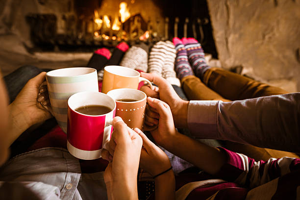 istock Friends sitting by the fireplace 512943537