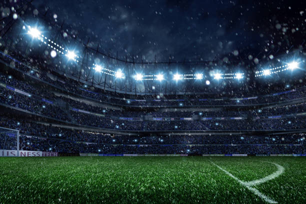 istock Dramatic football stadium with rain and snow 512959571