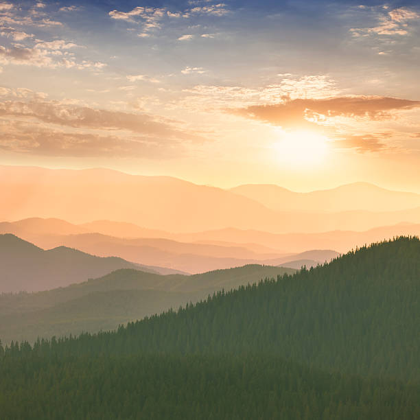 istock Colorful Sunset in the Mountains, hills, sun and sky 512960823