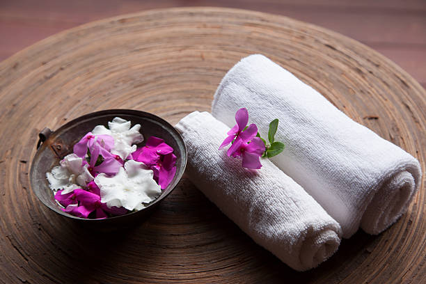 istock Towels with flowers in spa 512962089