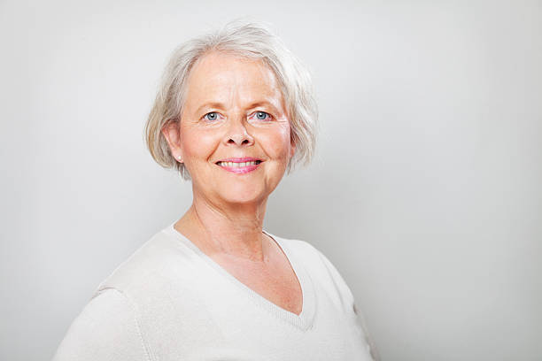 istock cheerful senior woman smiling 512964589