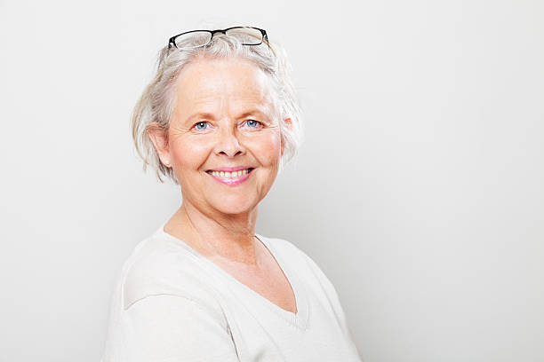 istock cheerful senior woman smiling 512964679