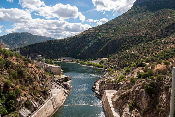 istock Sunny day in the dam build in the river. 512965322