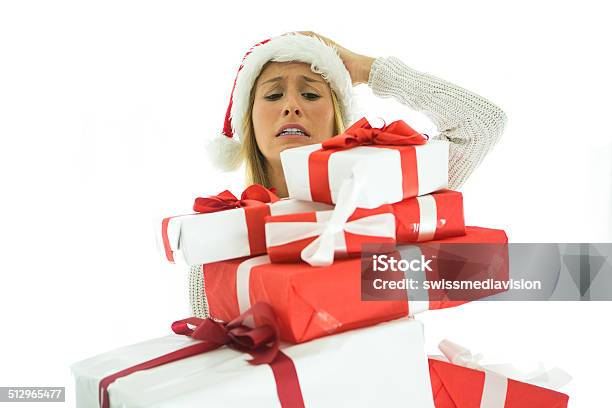 Christmas Stresswoman Holding Christmas Gift Stock Photo - Download Image Now - Christmas, Emotional Stress, Retail