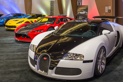 Detroit, MI, USA - January 10, 2016: Bugatti Veyron, Falcon F7, and  Lingenfelter Z06 Corvette at The Gallery, sponsored by the North American International Auto Show (NAIAS) and the MGM Grand Detroit.