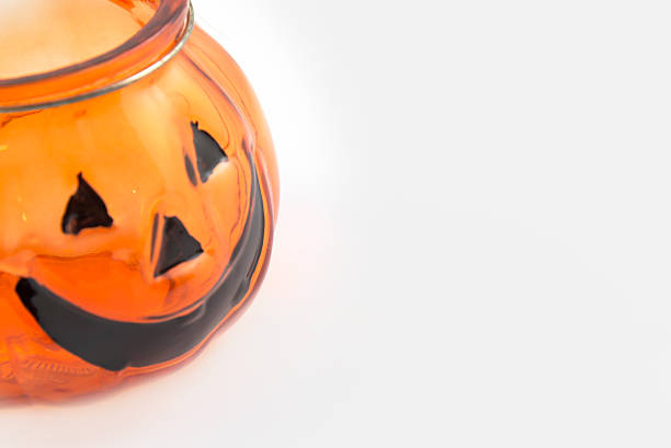 istock Halloween Pumpkin glass on the left isolated 512969536