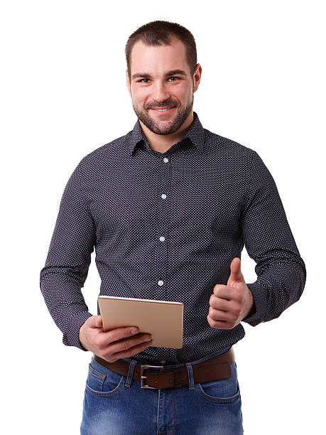 istock Man holding tablet and makes a gesture thumbs up 512971226