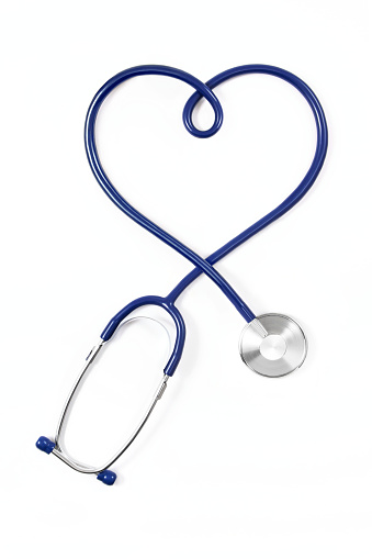 Photo of a heart shape stethoscope on white background.