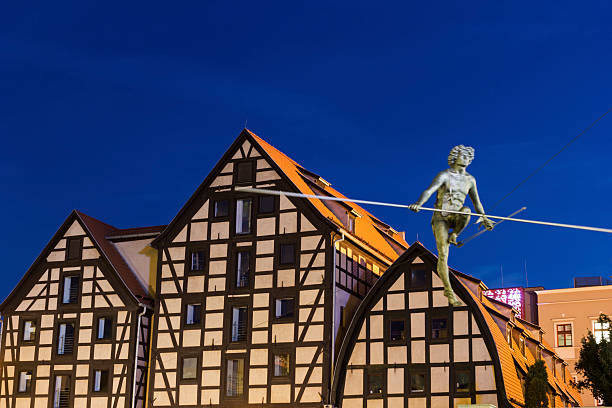Old town view with famous statue on the rope with old Granaries in the background in Bydgoszcz, Poland