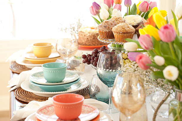 istock Easter Elegant Place Setting Dining Table with Vase of Tulips 512974008