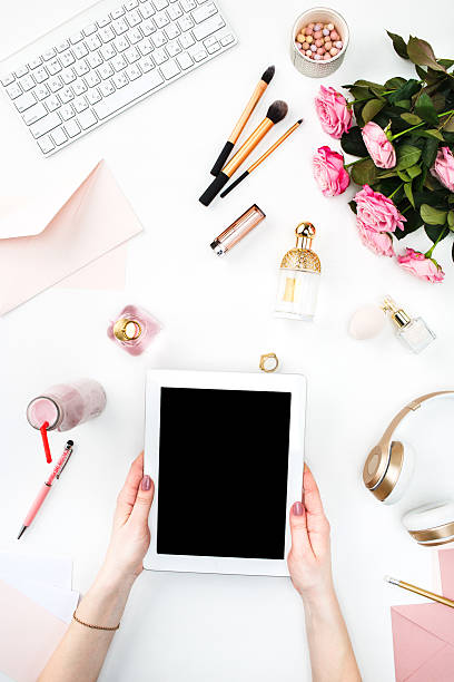 istock The female hands and tablet 512975238