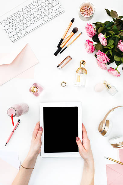 istock The female hands and tablet 512975336