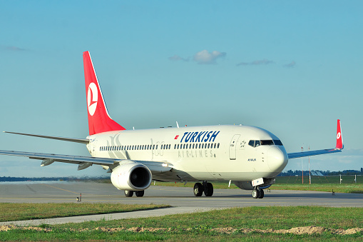 Borispol, Ukraine - September 17, 2011: Turkish Airlines Boeing 737 taxiing to the runway to takeoff