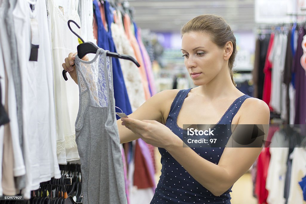 woman buys clothes Supermarket Stock Photo