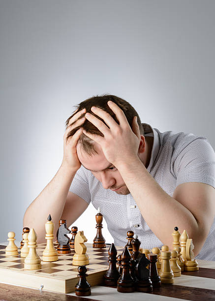 istock The man is thinking about a game of chess 512979916