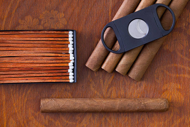 istock Different cigars on the decorative wooden desk 512980830