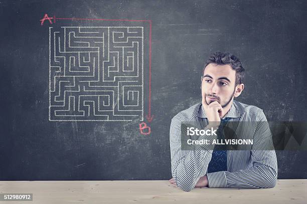 Blackboard And A Maze Stock Photo - Download Image Now - Adult, Alertness, Arrow Symbol