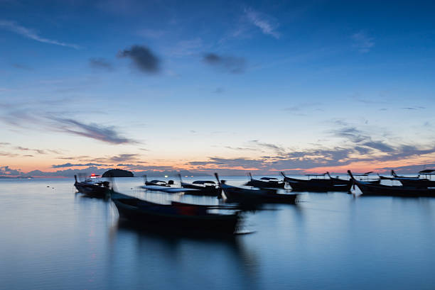 istock Long exposure long tail boats in Koh Lipe Island. 512981478