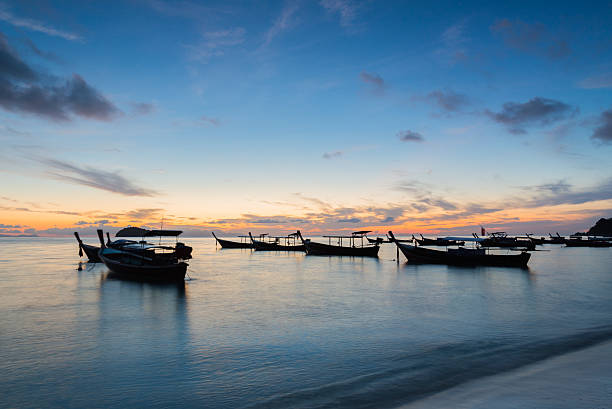 istock Long exposure long tail boats in Koh Lipe Island. 512981906