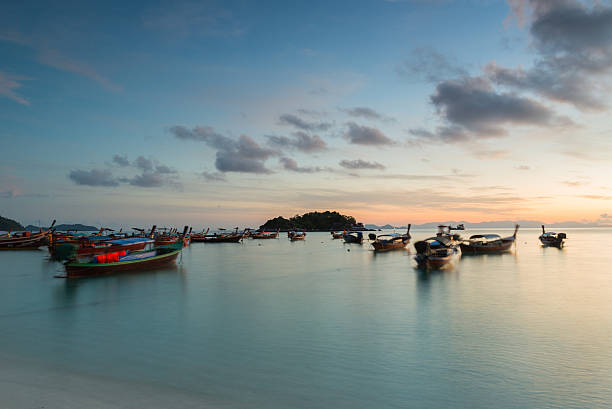 istock Long exposure long tail boats in Koh Lipe Island. 512981982