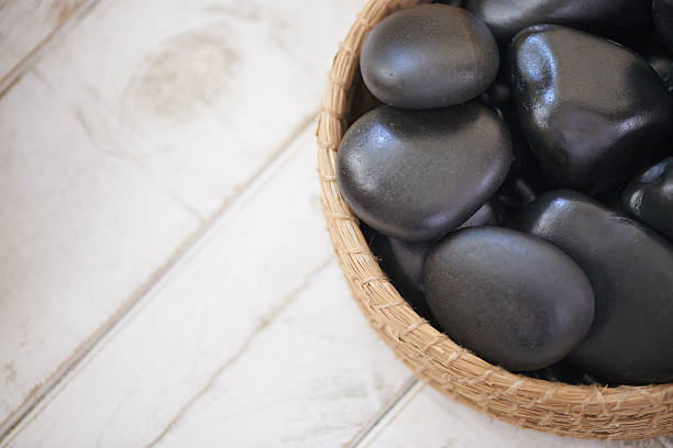 Closeup shot of warm stones waiting to be used for a massage