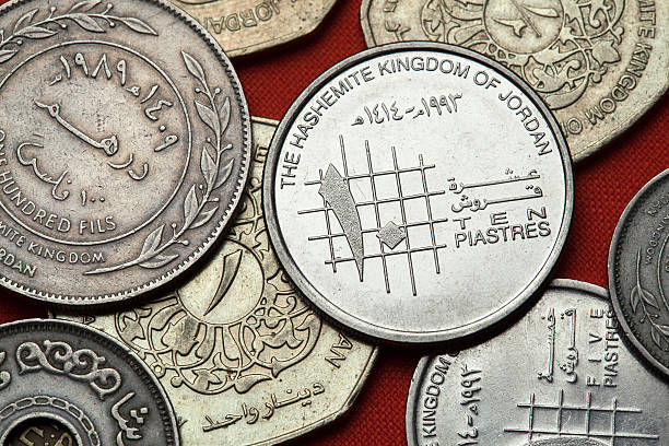 Coins of Jordan Coins of Jordan. Jordanian 10 piastres (qirsh) coin. dinar stock pictures, royalty-free photos & images