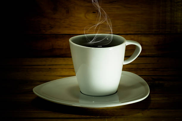 istock Coffee cup and saucer on a wood. 512984167
