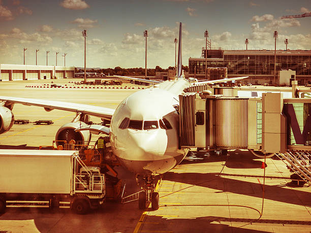 istock commercial jet parked on the track 512985417