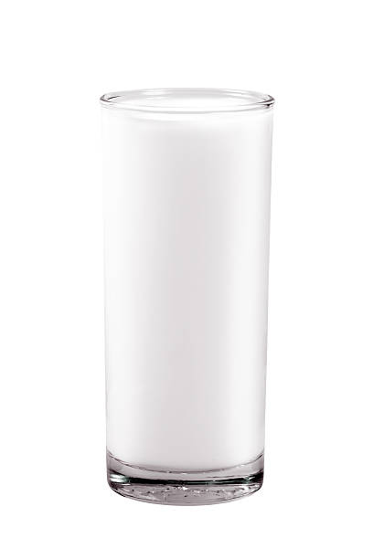 istock Glass of milk isolated on white background 512985912