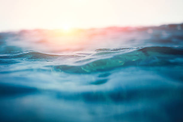 Sea Waves Sea waves at sunset. View from the water. horizon over water stock pictures, royalty-free photos & images