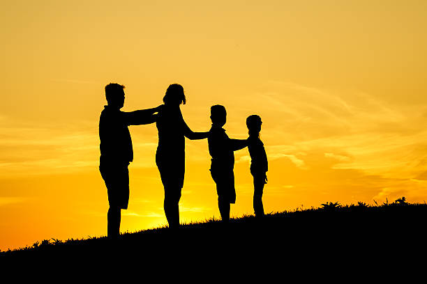 istock Happy family silhouette 512986869