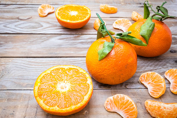 istock several mature citrus on an old wooden table 512987476