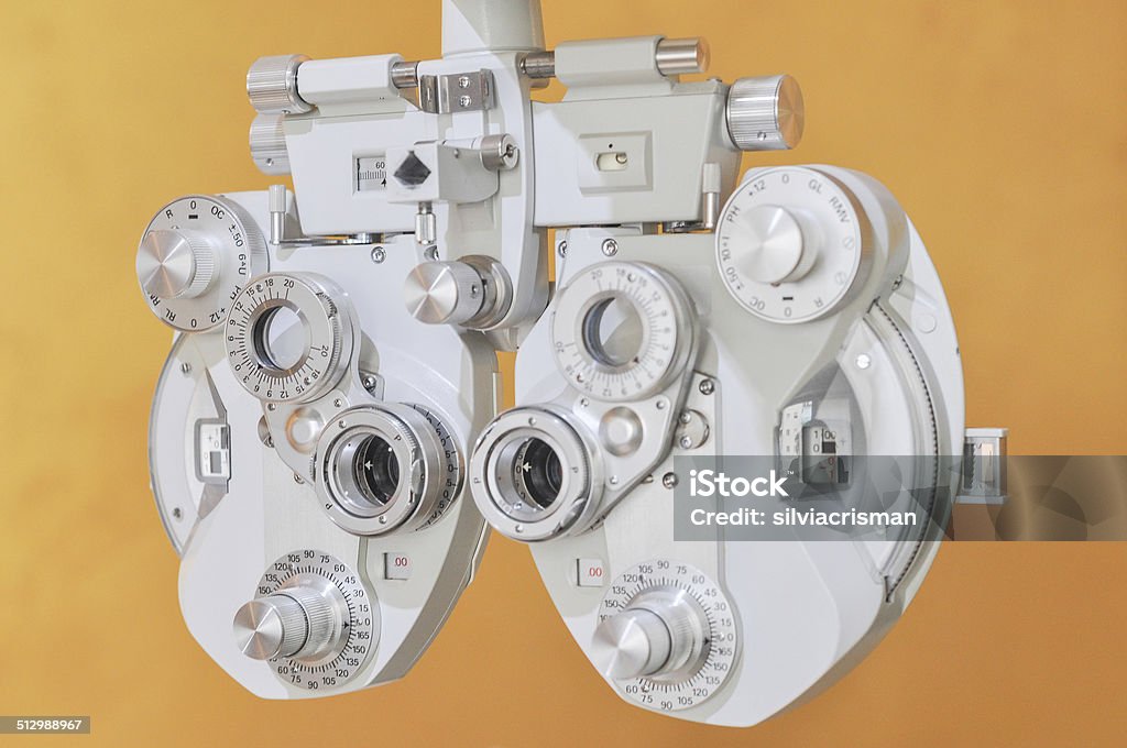 Optician diopter Professional optometrist diopter tool in an optician laboratory Assistance Stock Photo