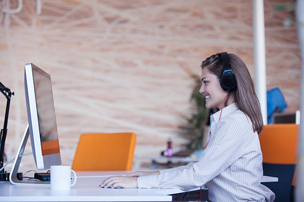 istock secretary with headphones 512989228