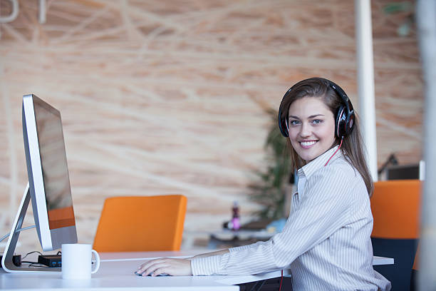 istock secretary with headphones 512989422