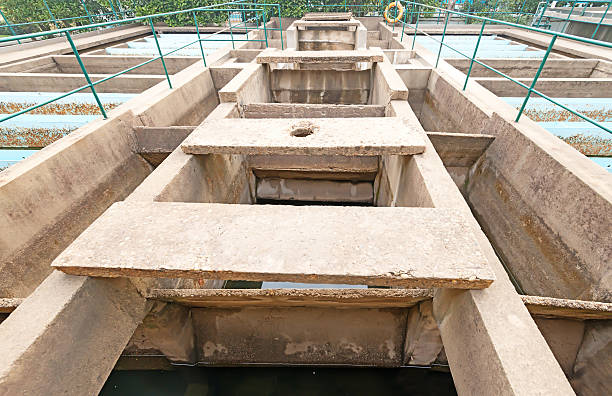 Clean natural freshwater spring running into an old stone bowl