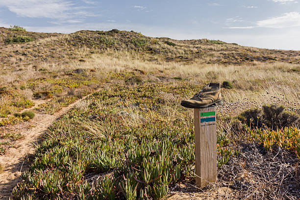 istock old boot over pole hiking path in alentejo port 512989718