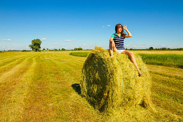 istock Coquette girl on the sunny field. 512989736