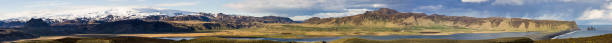 istock panoramic view of the vik beach and glacier over it 512990480