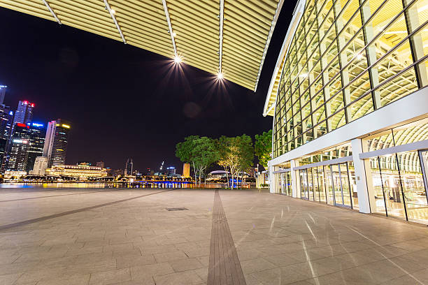 istock illuminated urban building exterior from waterfront 512992351