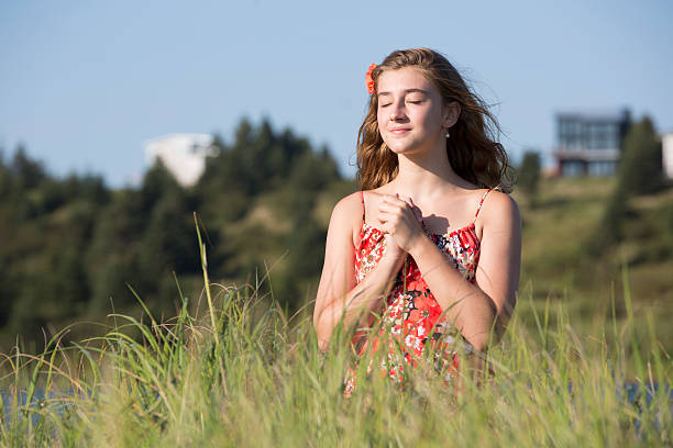 istock Cute girl basking in the sun 512992355