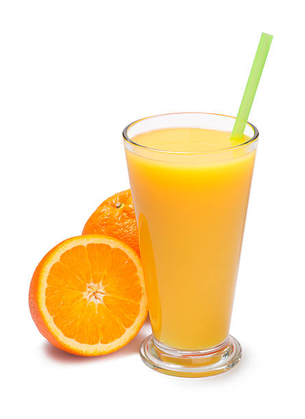 istock glass of freshly pressed orange juice isolated 512992784