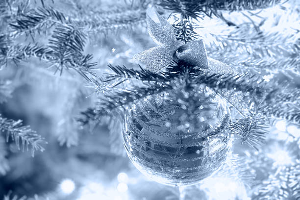 istock Christmas bauble hanging on a spruce branch 512993515